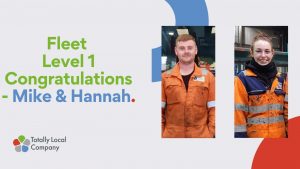 wording - Fleet level 1 congrtatulations Mike and Hannah, with two images of people in orange mechanic outfits - Mike and Hannah